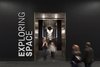 north design science museum exploring space signage